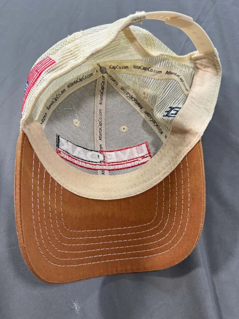Oak Construction Supply Husqvarna Trucker Hat Brown Tan Snapback Cap